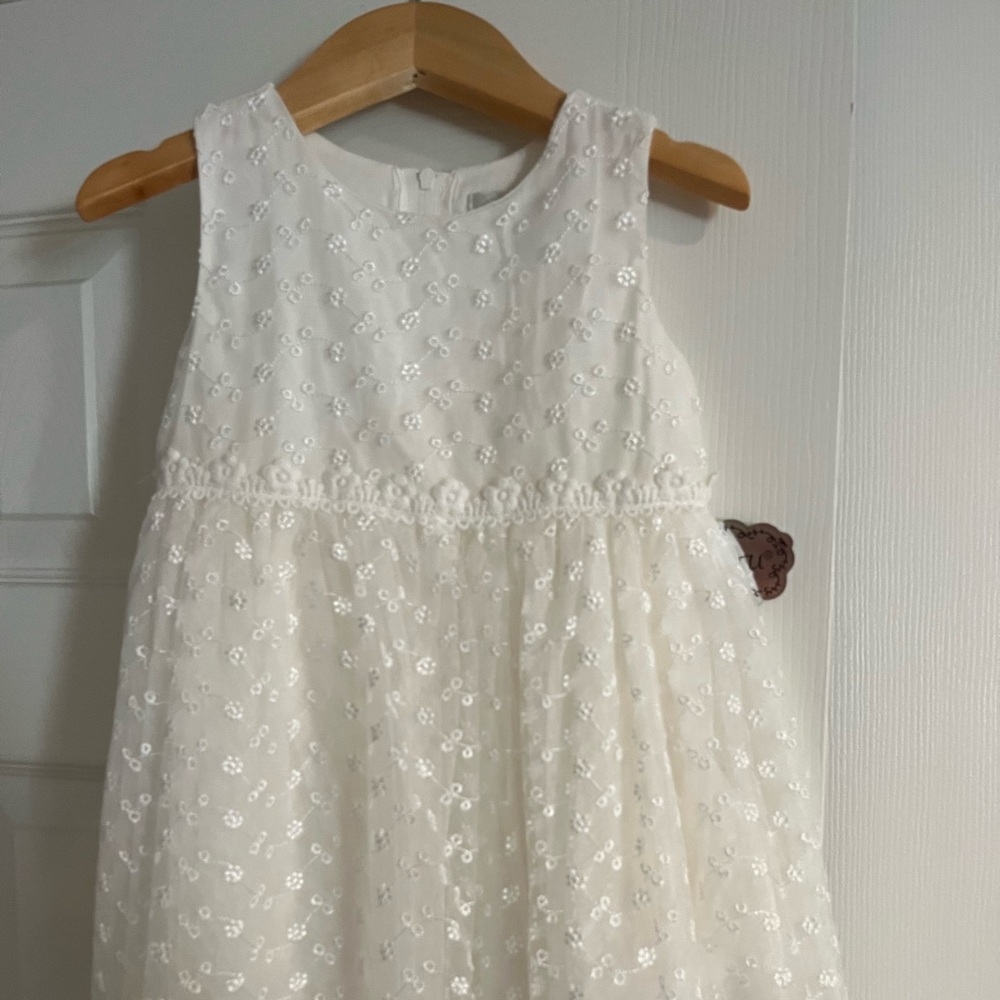 Girl’s white dressy dress with flowers